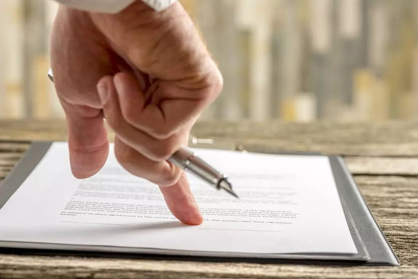Family meeting with legal advisor, showing when a Will is crucial—highlighting Trusted Will Writing Farnham for essential life planning.
